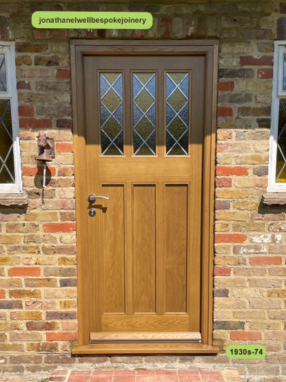 1930s front door oak minster and coloured lead glass